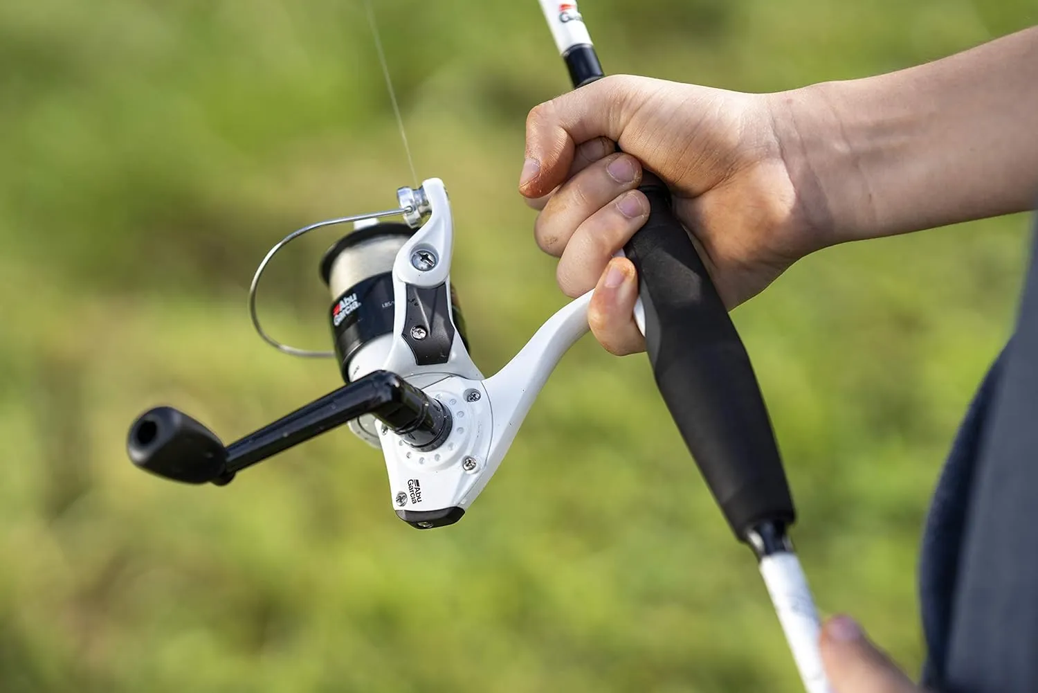 Abu Garcia 6’ Ike Dude Youth Fishing Rod and Reel Spinning Combo, 2-Piece Rod, Size 30 Reel, Right/Left Handle Position,White